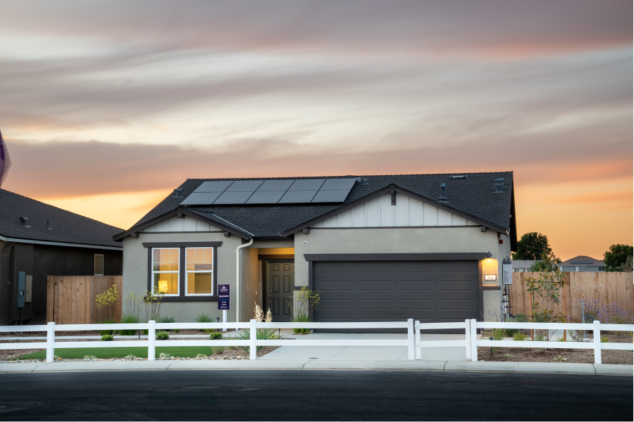 A house with a white fence.