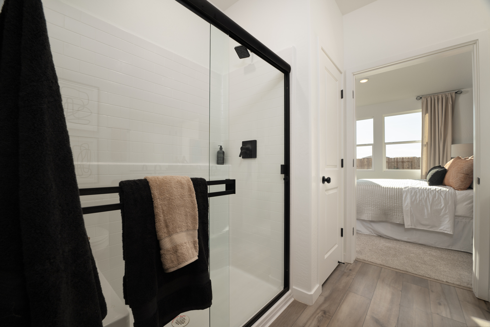 A closet with a glass door.