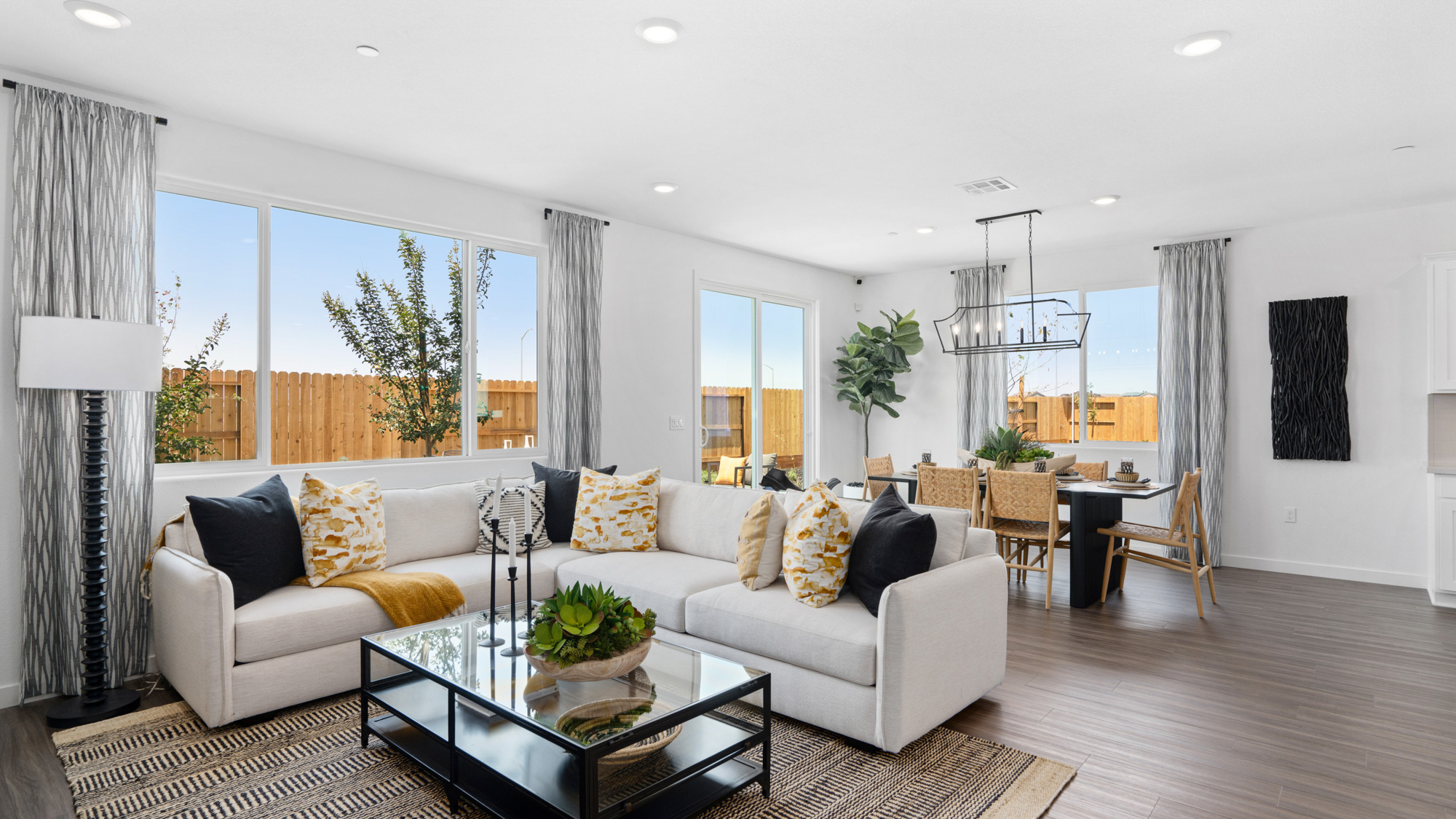 A living room with a large window.