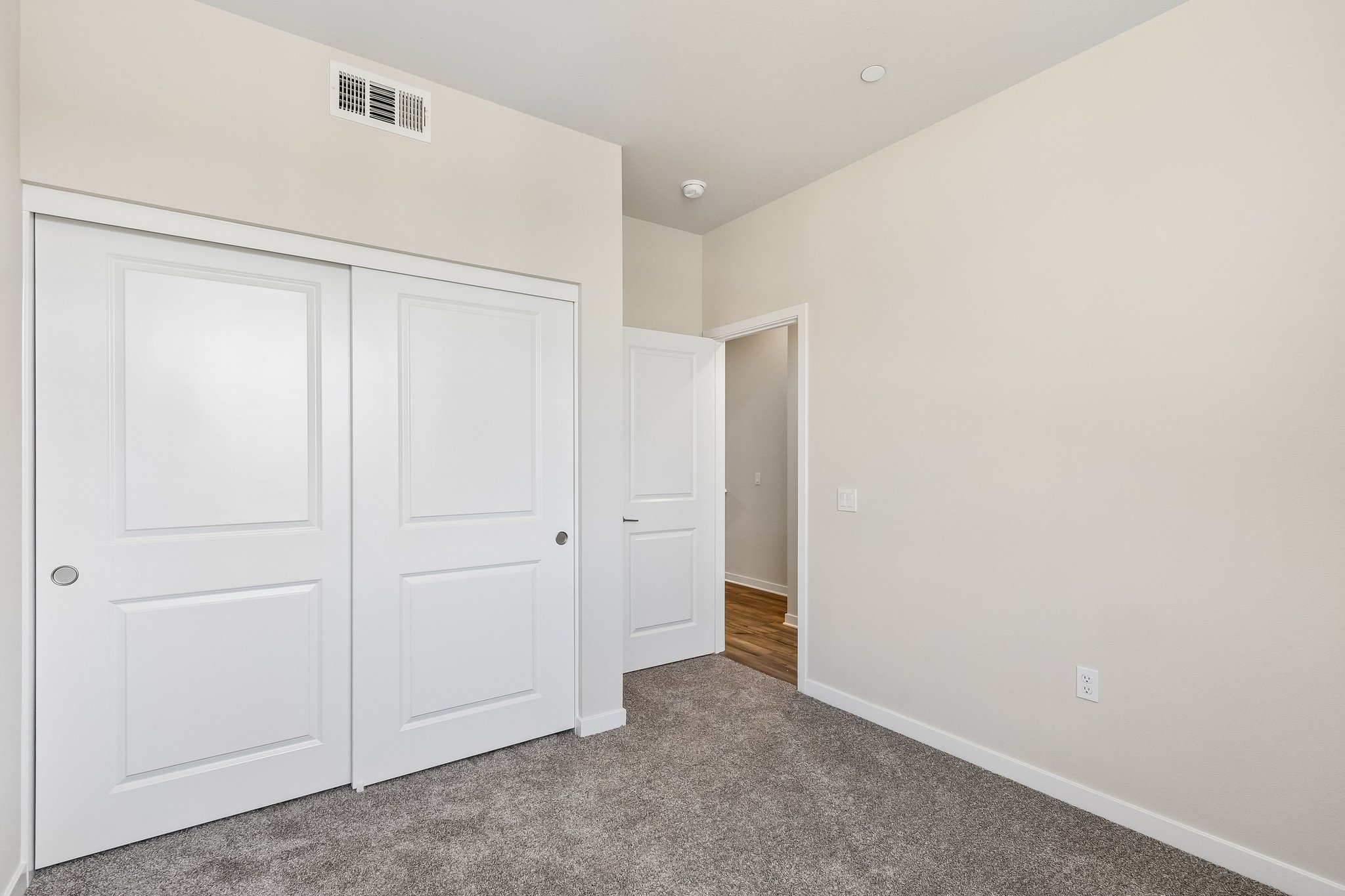 A room with white doors.