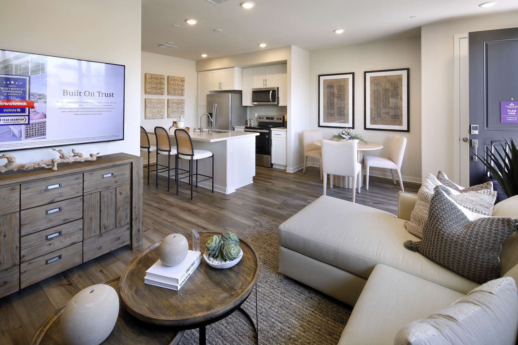 A living room with a large tv.