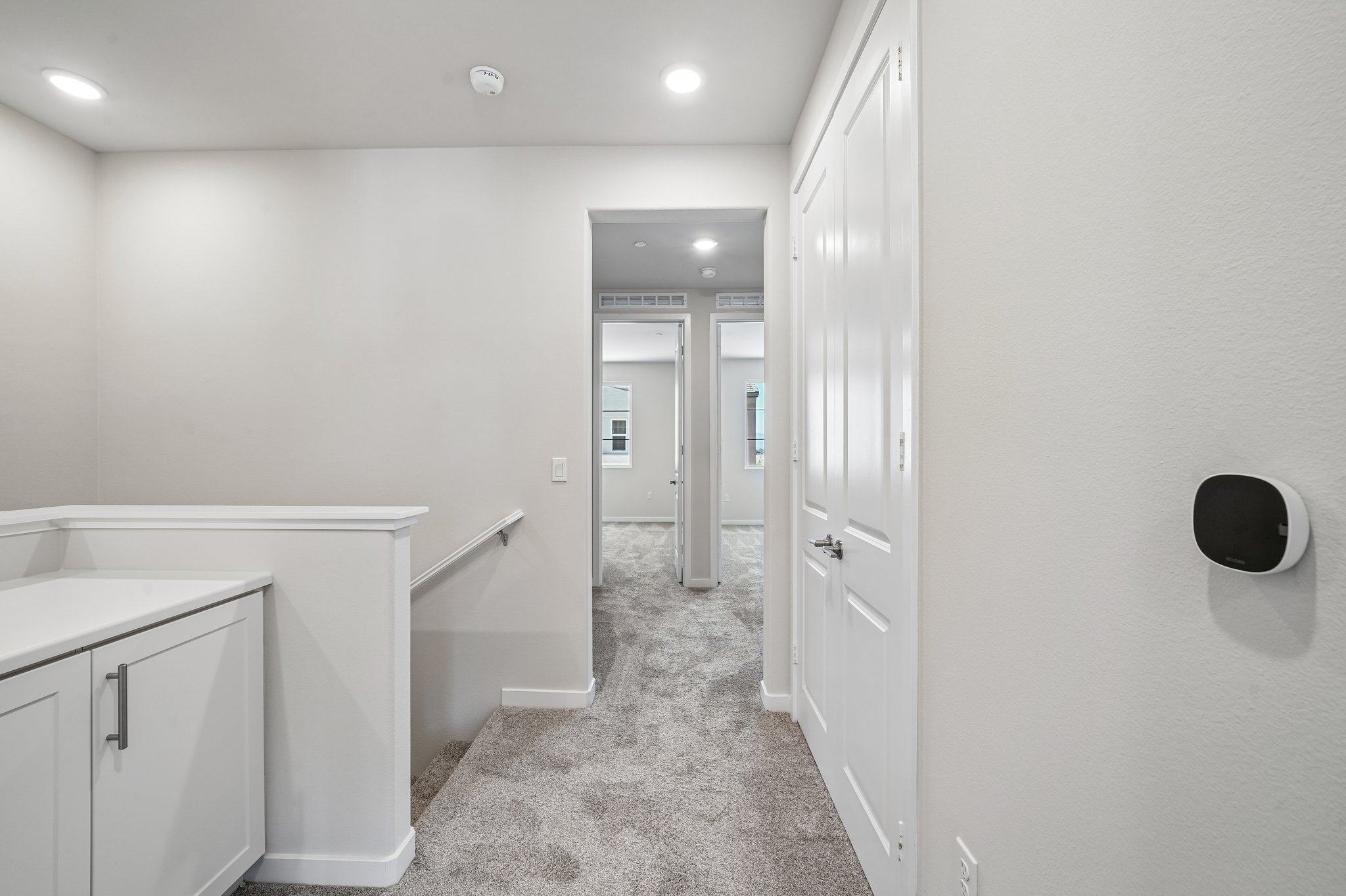 A bathroom with a shower unit.