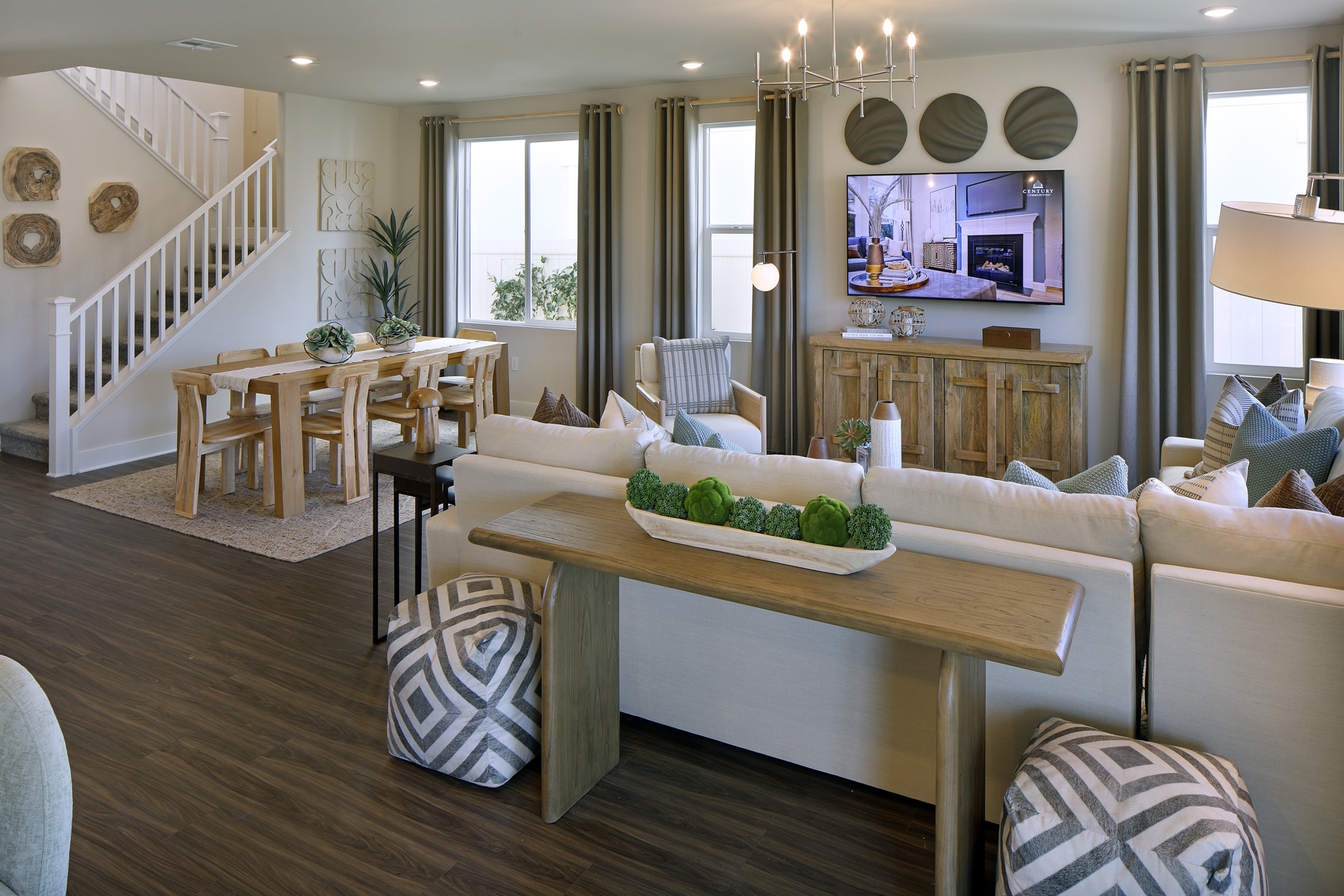 A living room with a large tv.