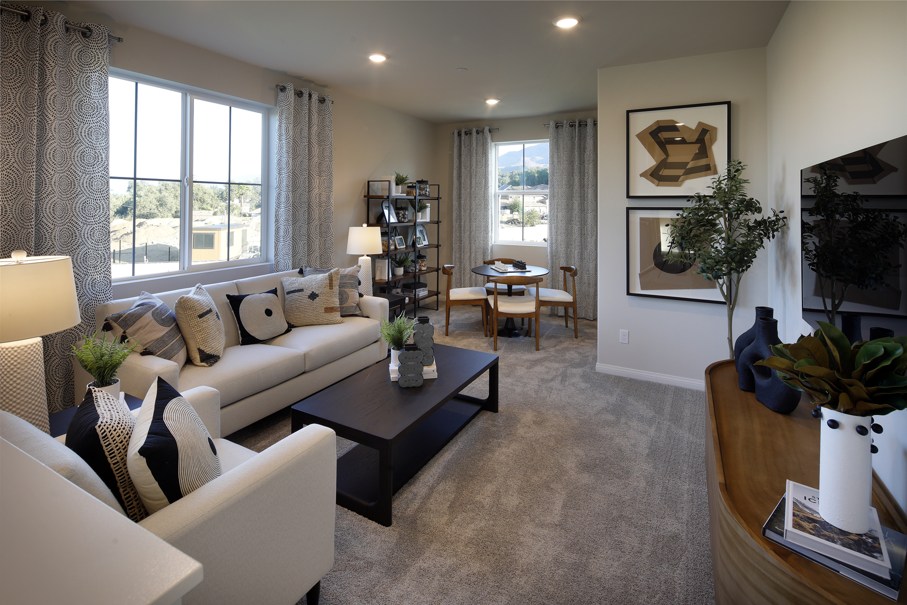 A living room with a large window.