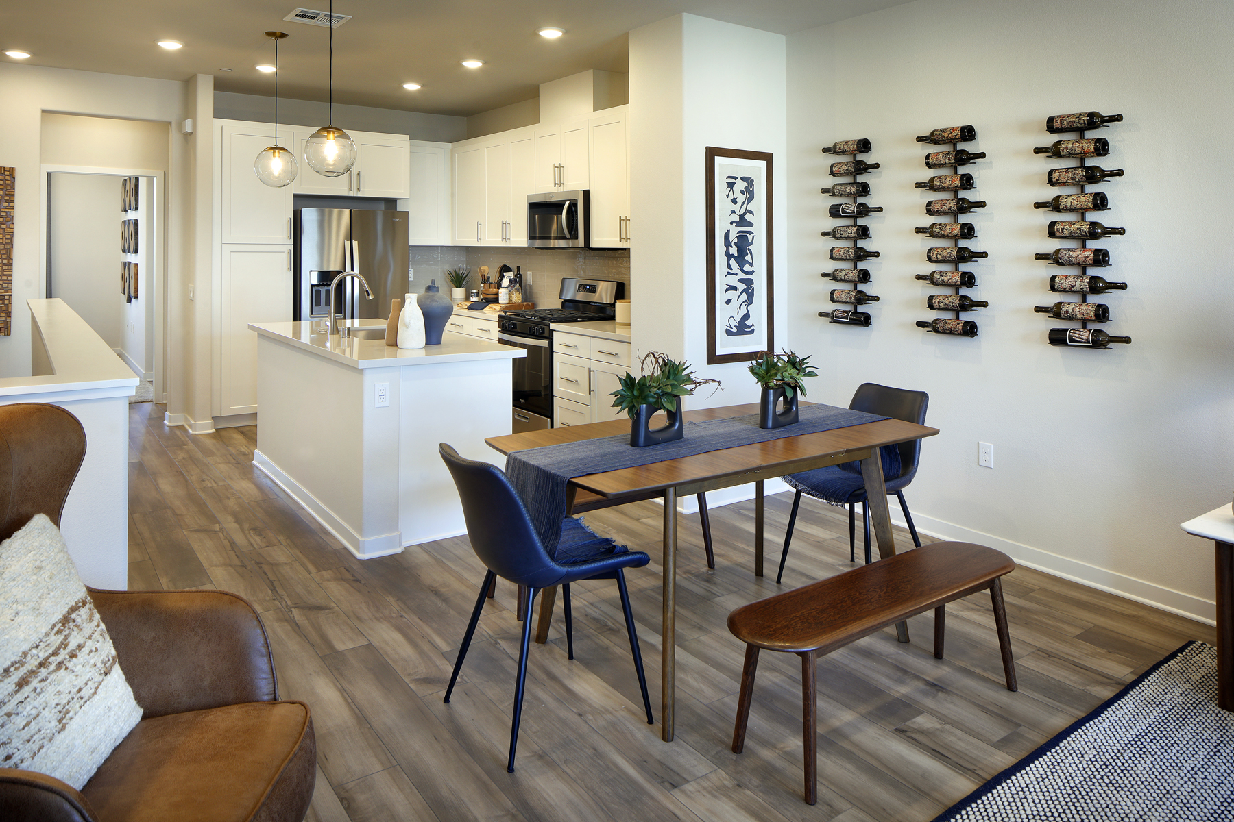 A kitchen with a dining table.