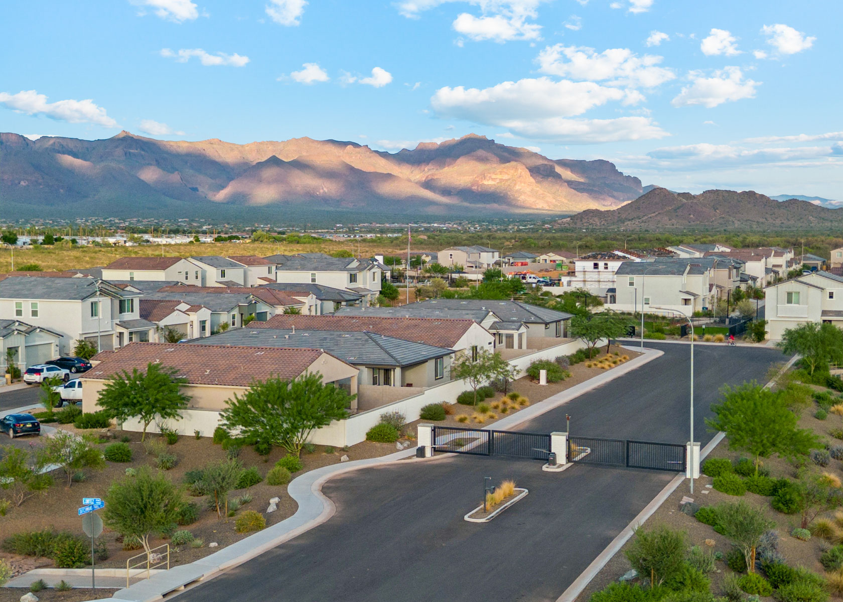 A town with a mountain in the background.