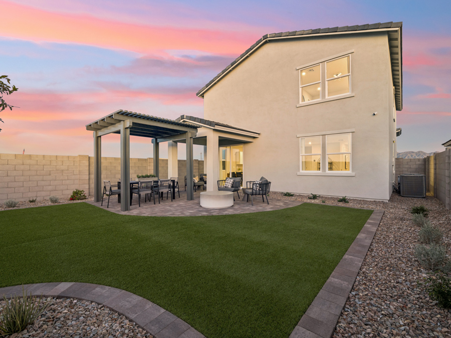 A house with a patio and a pool.