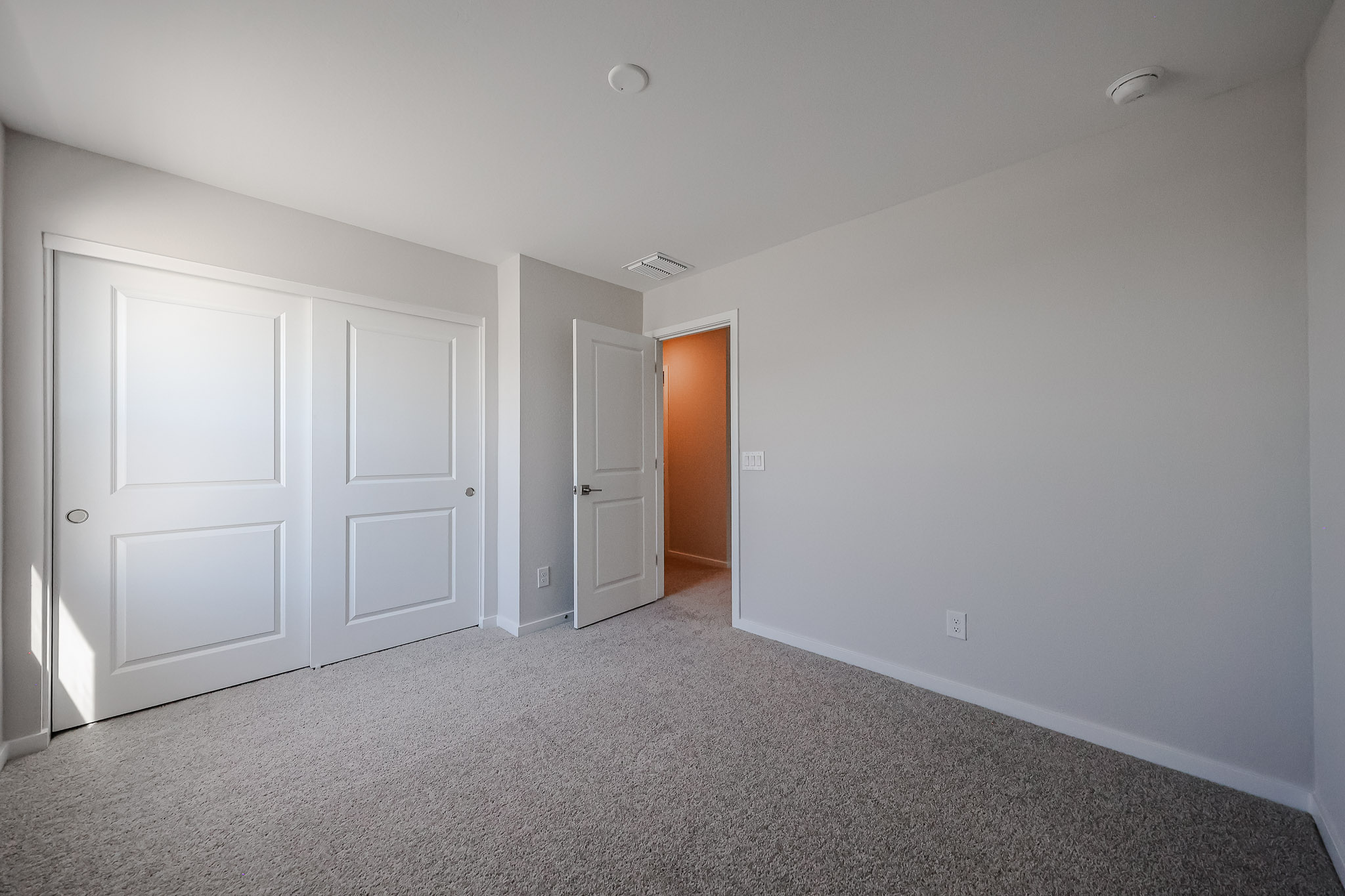 A room with white doors.