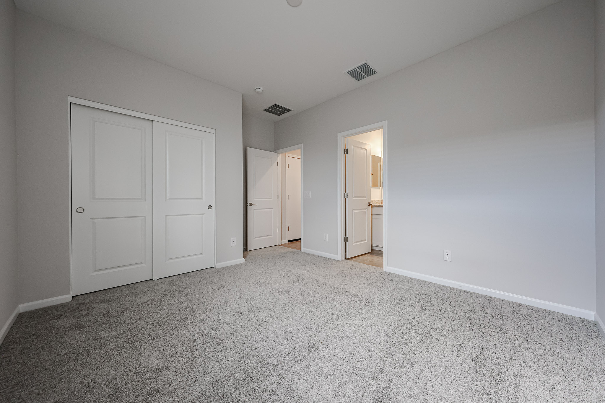 A room with white doors.