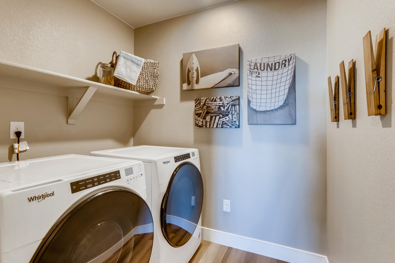 A washer and dryer in a room.