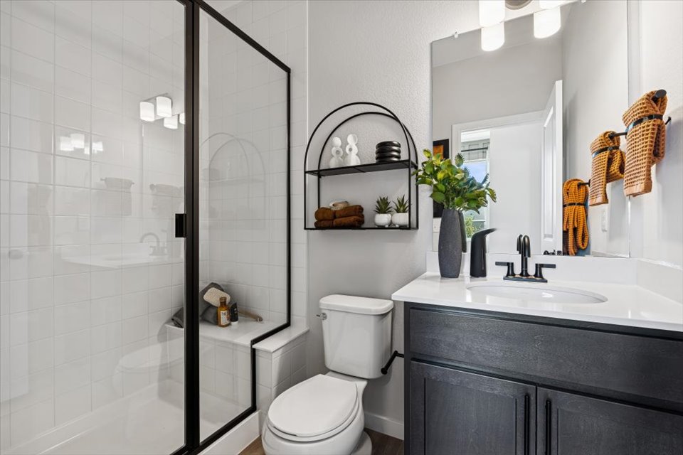 A bathroom with a glass shower.