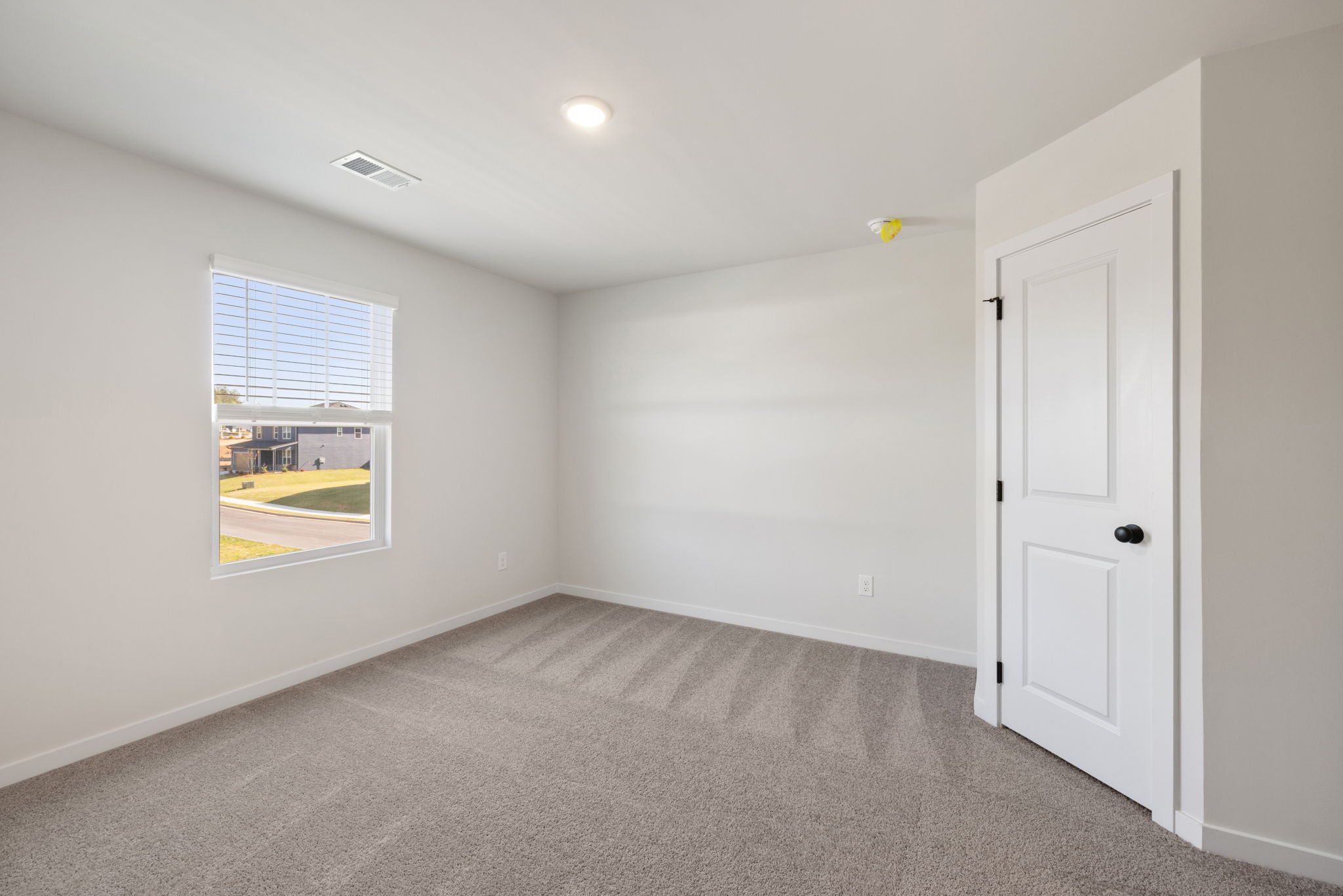 A room with white doors.
