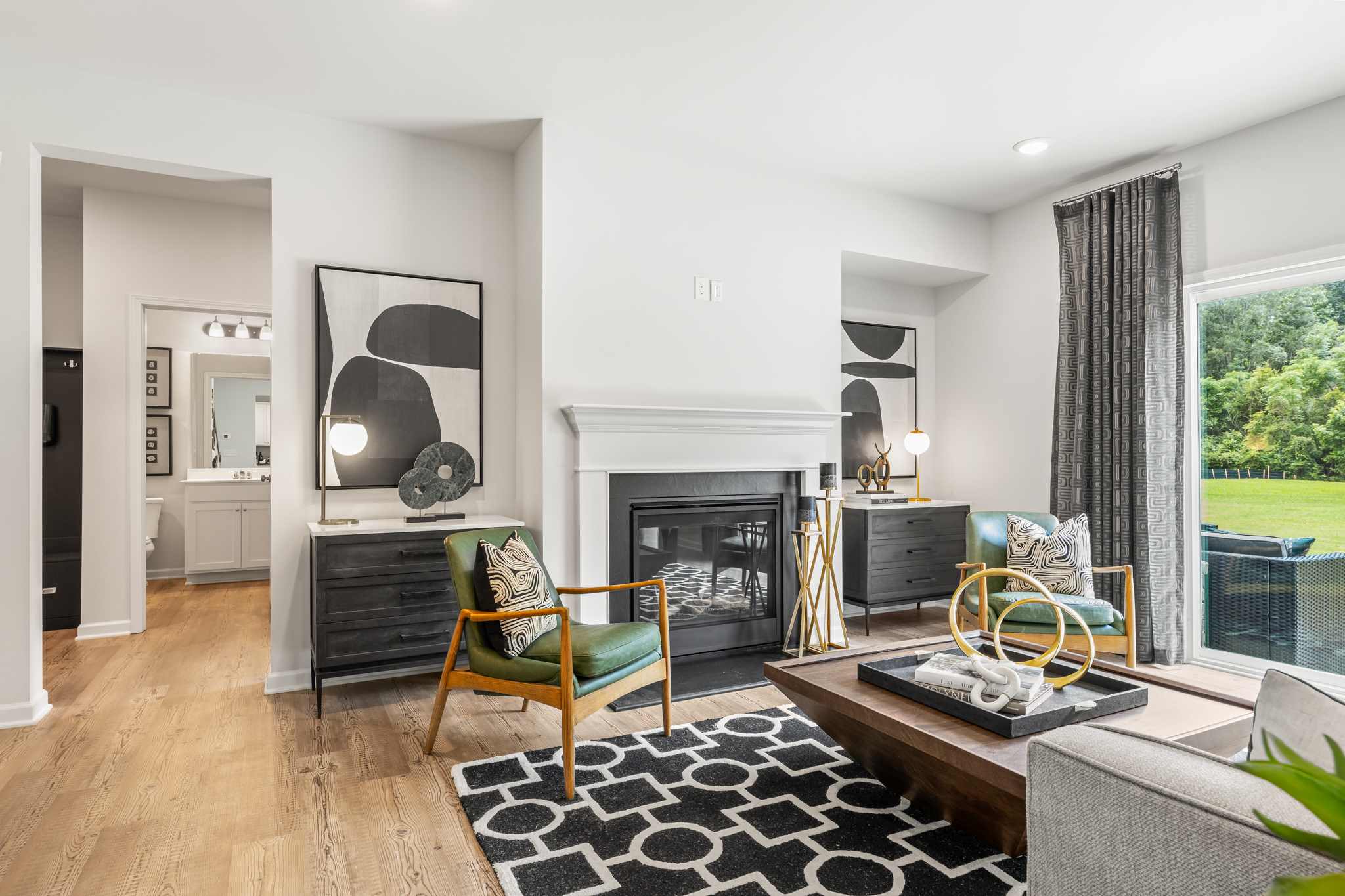 A living room with a fireplace.