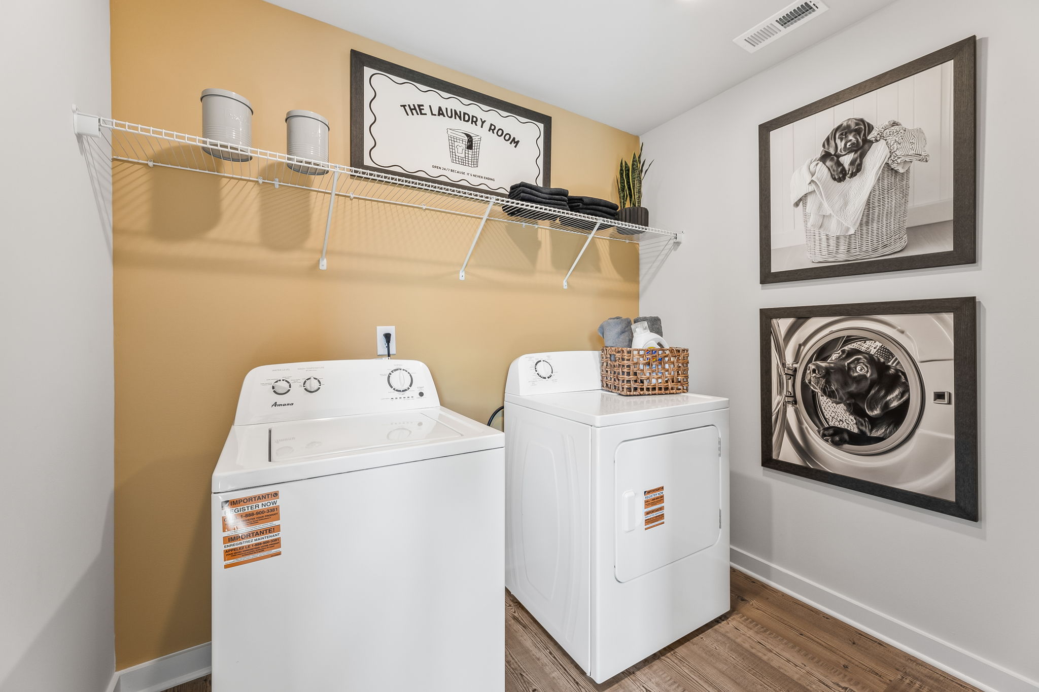 A laundry room with a washer and dryer.