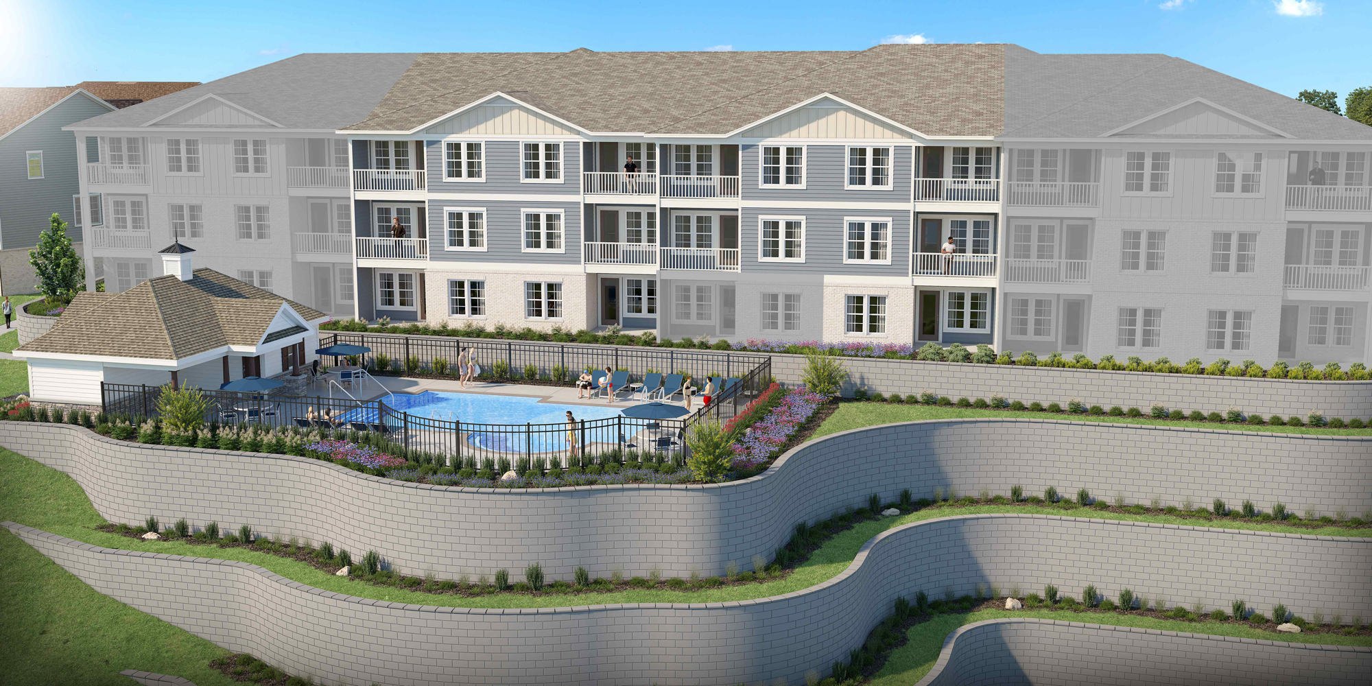 A large white building with a pool.