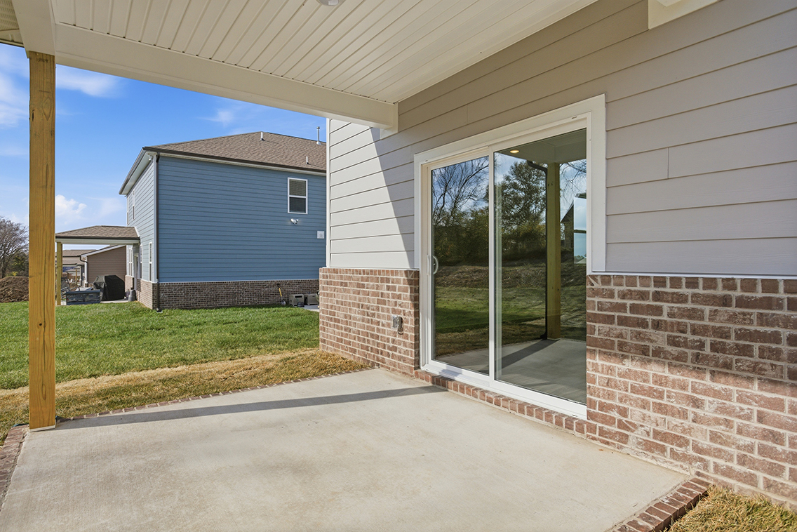 A house with a brick patio.