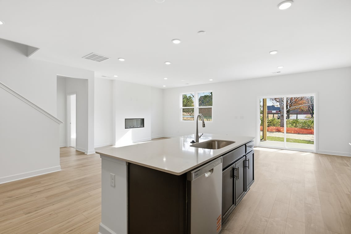 A kitchen with a large island.