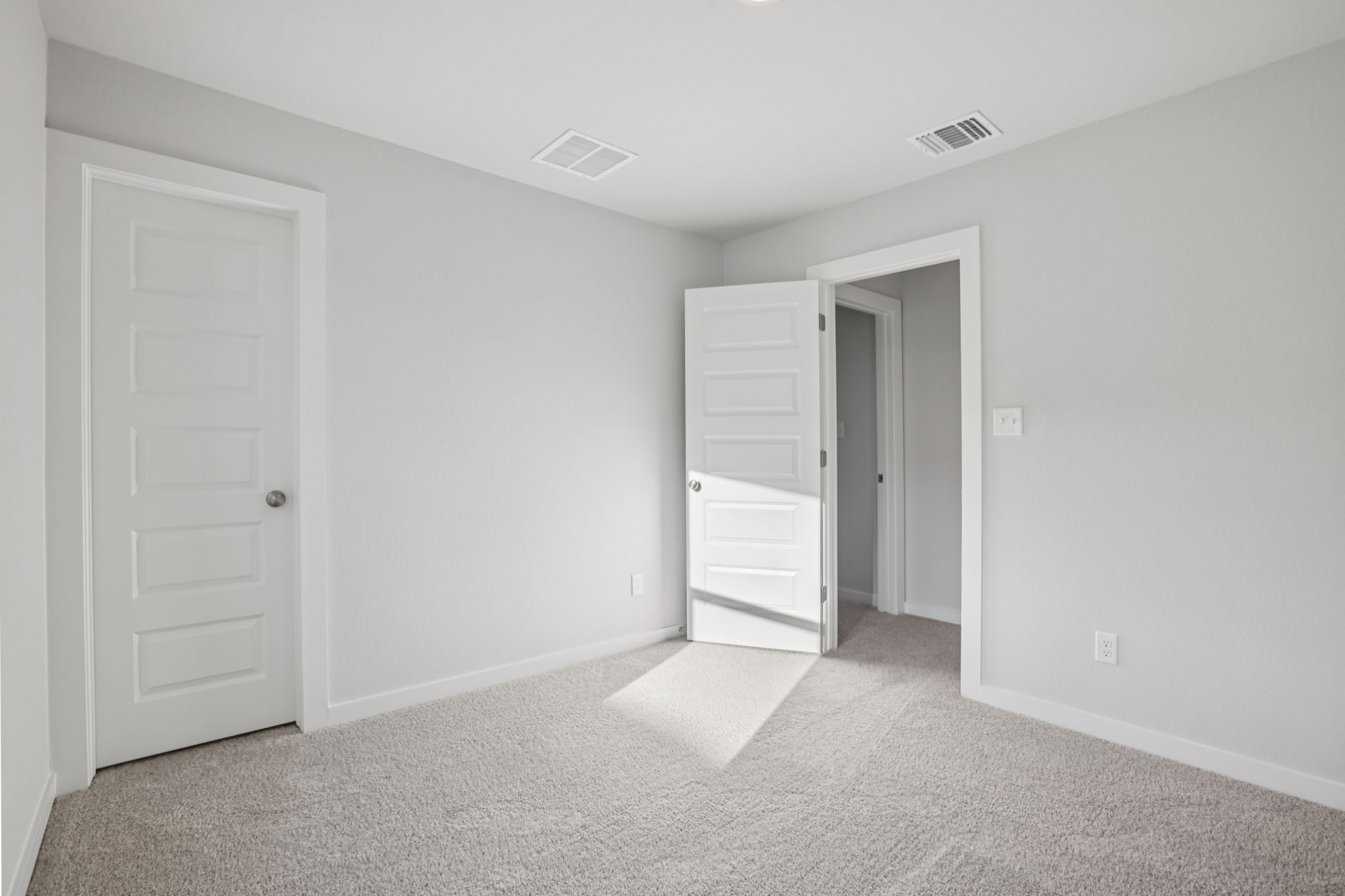 A room with white doors.