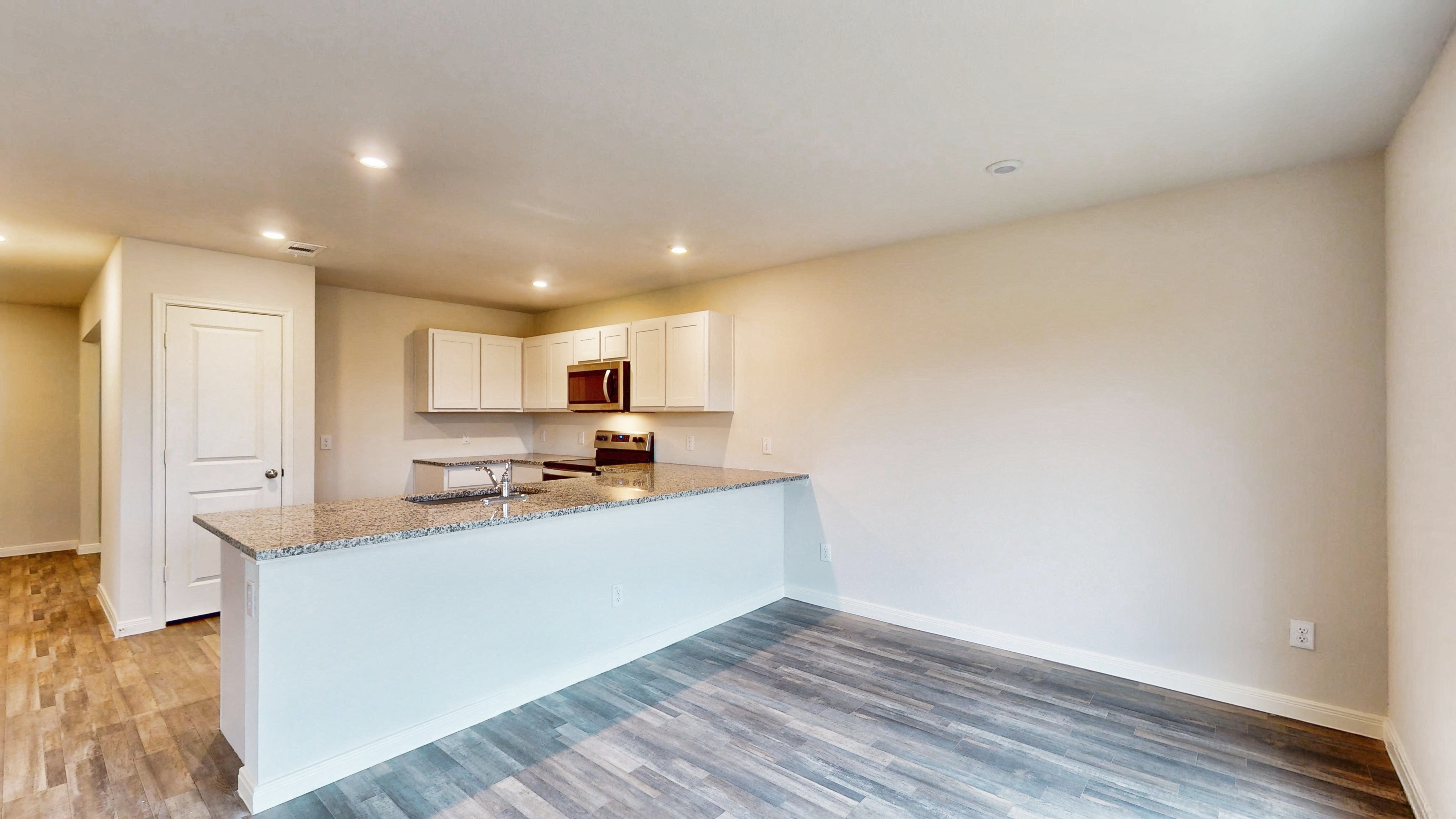 A kitchen with a large island.