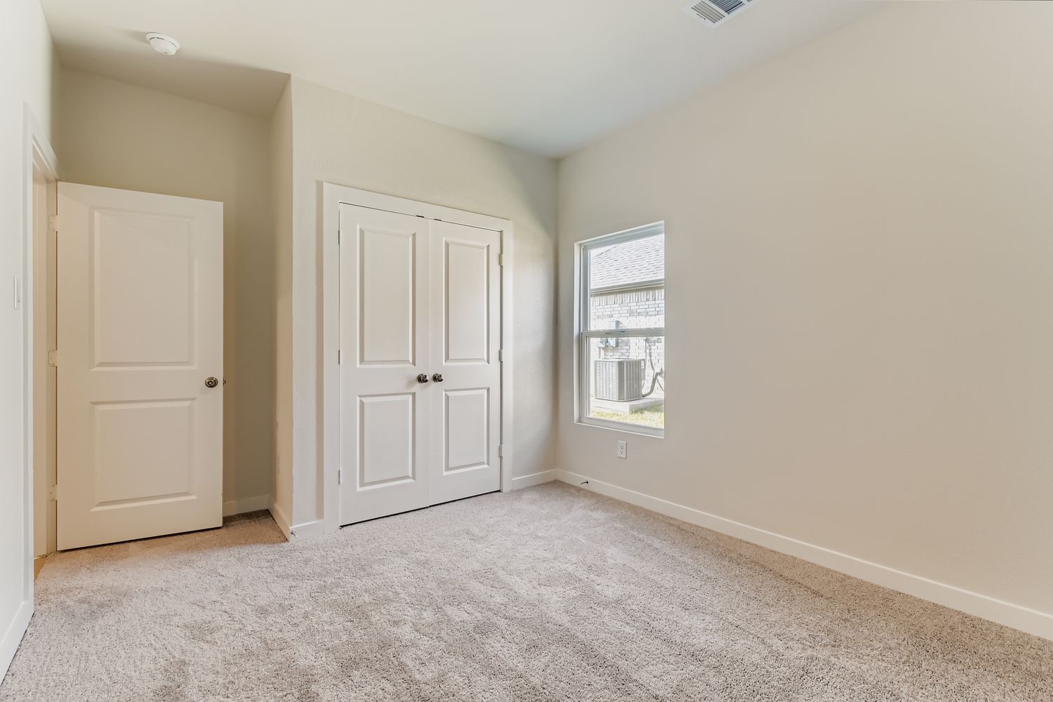 A room with white doors.
