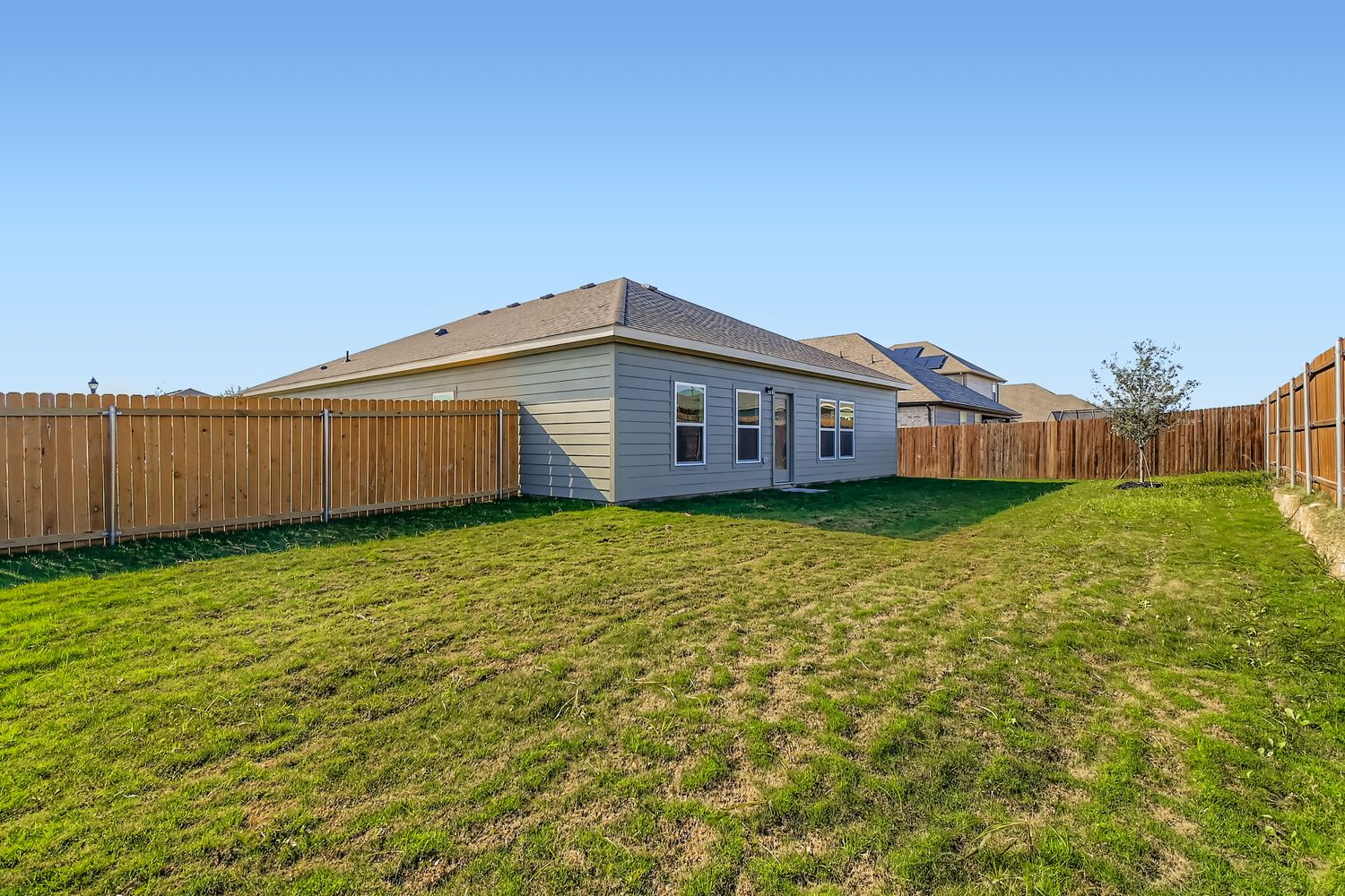 A house with a fence around it.
