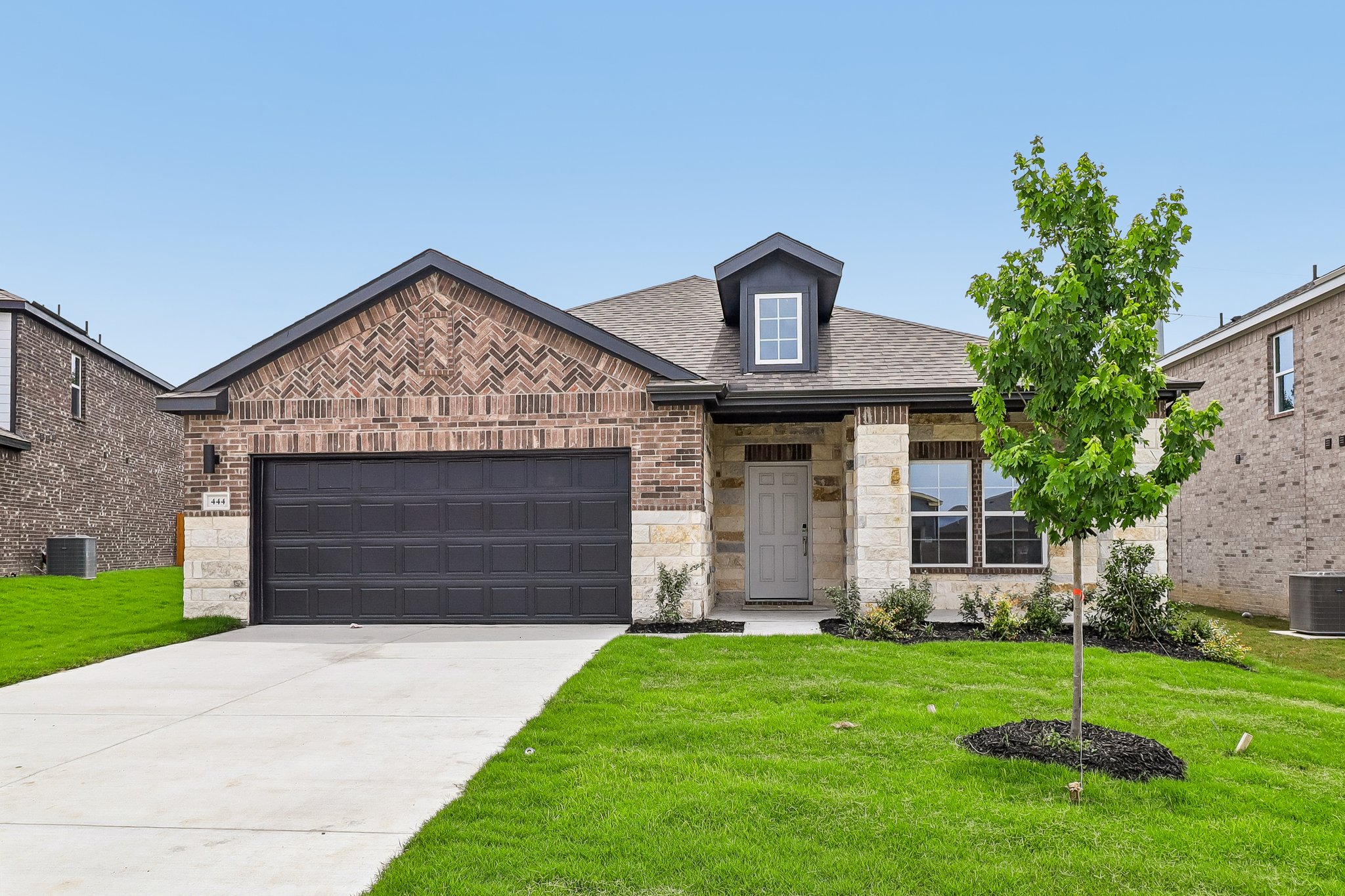 A house with a driveway.