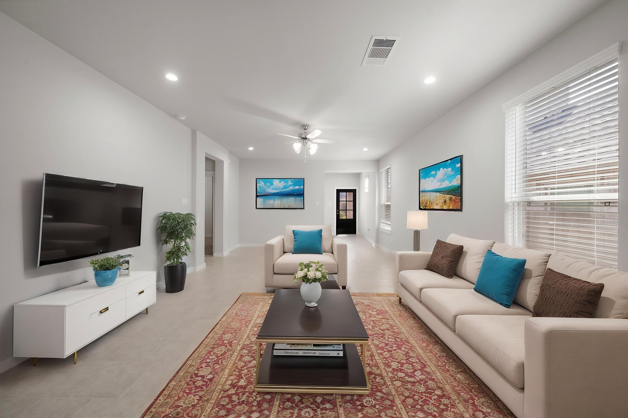 A living room with a tv and couches.