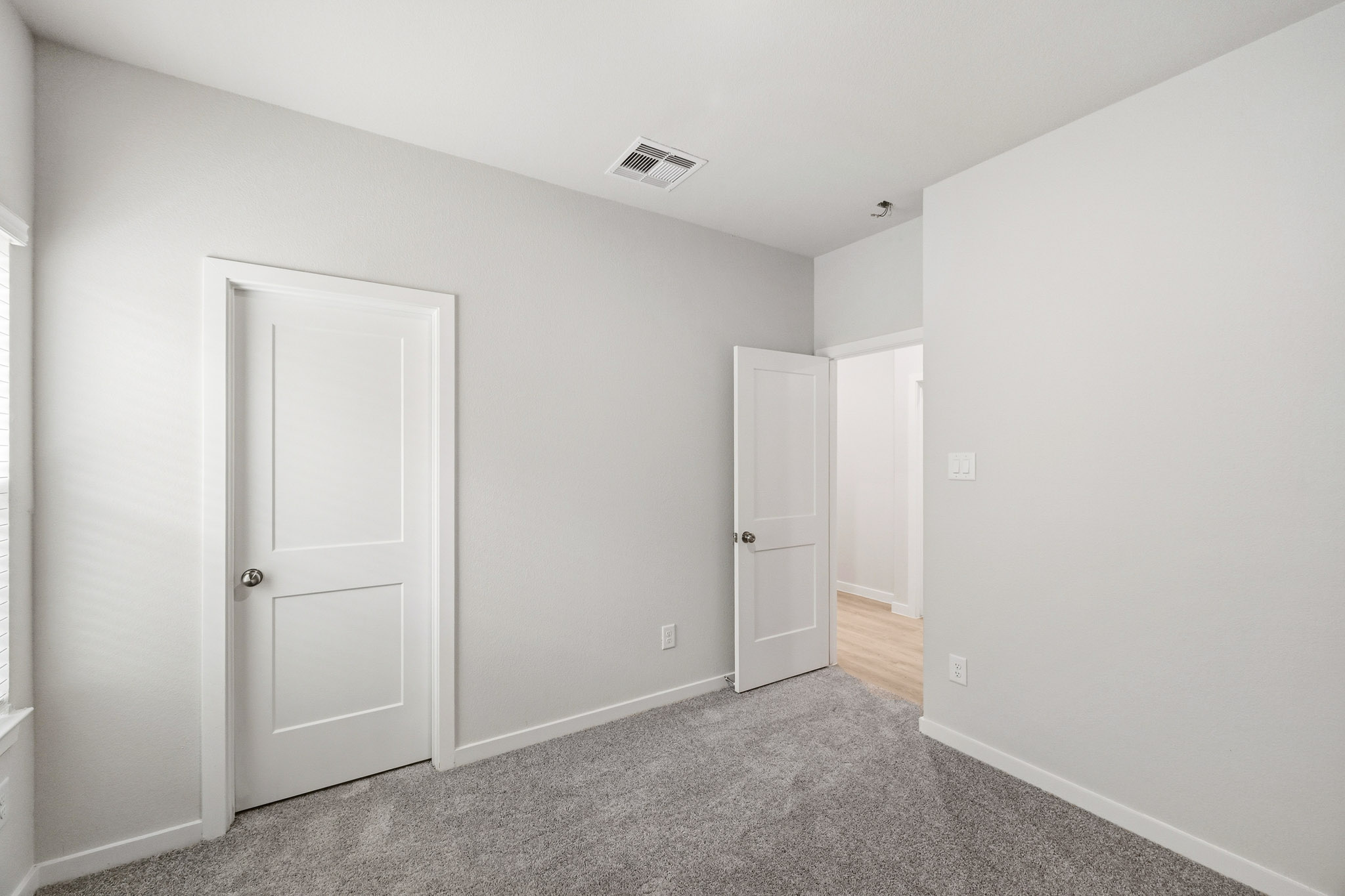 A room with white doors.