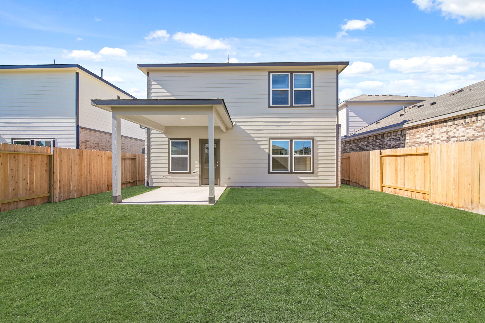 A house with a fence around it.
