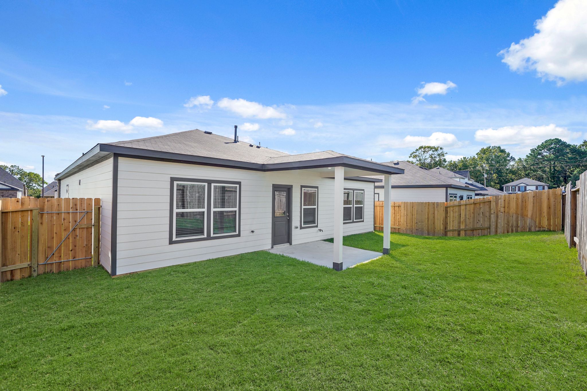 A house with a fence around it.