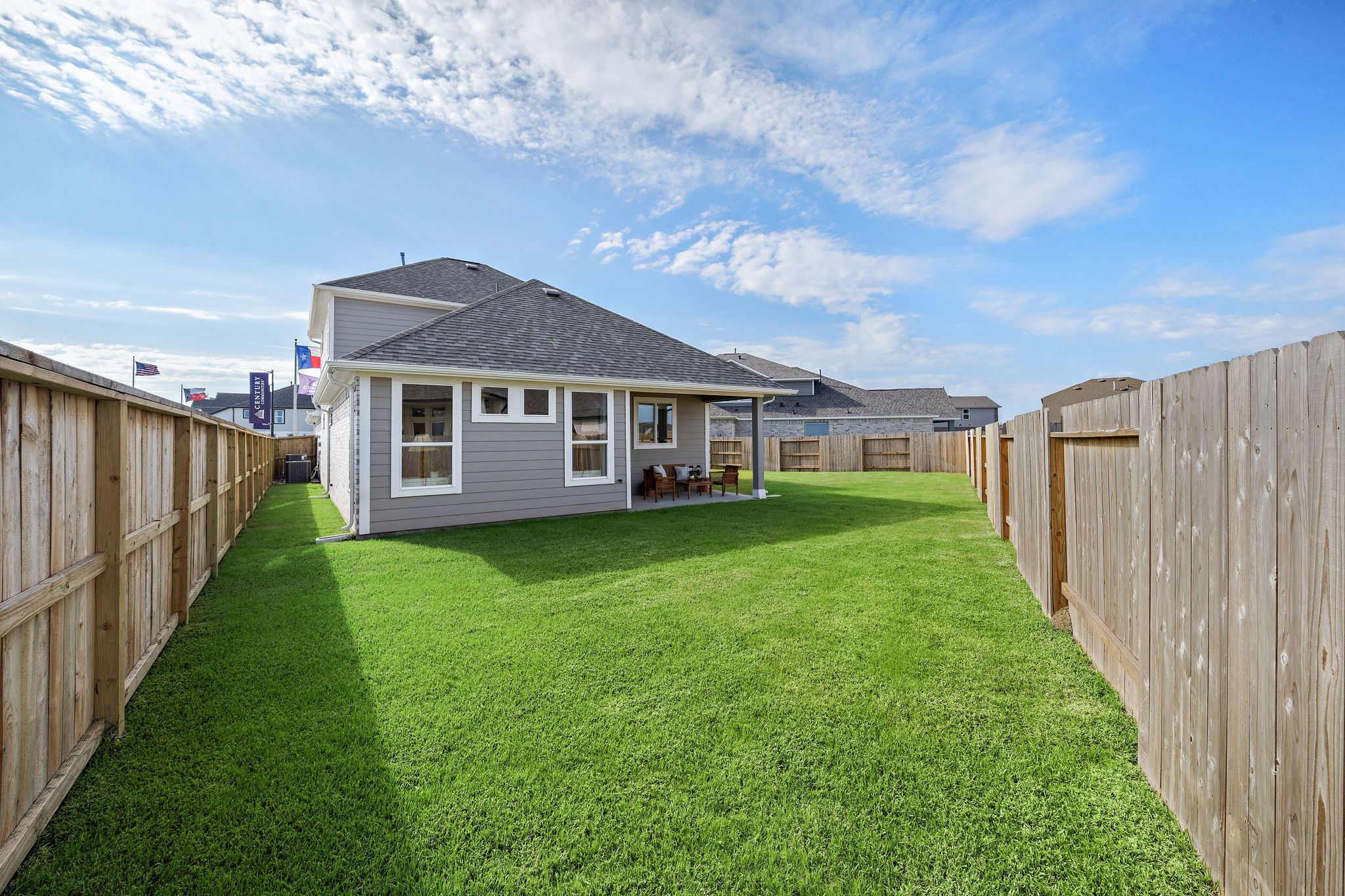 A house with a fence around it.