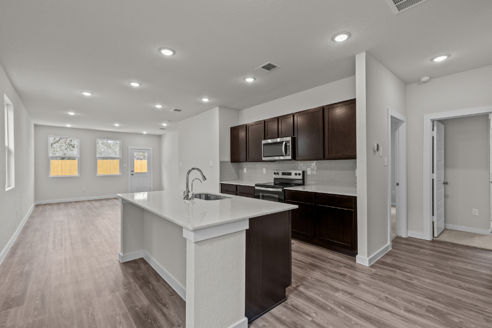 A kitchen with a large island.