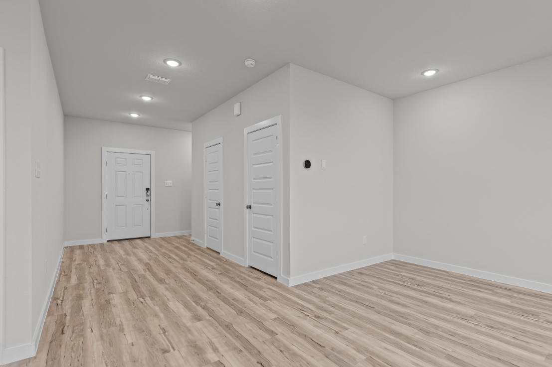 A room with white doors.