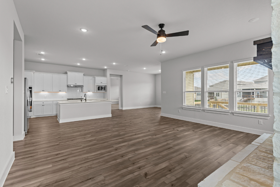 A large kitchen with white cabinets.