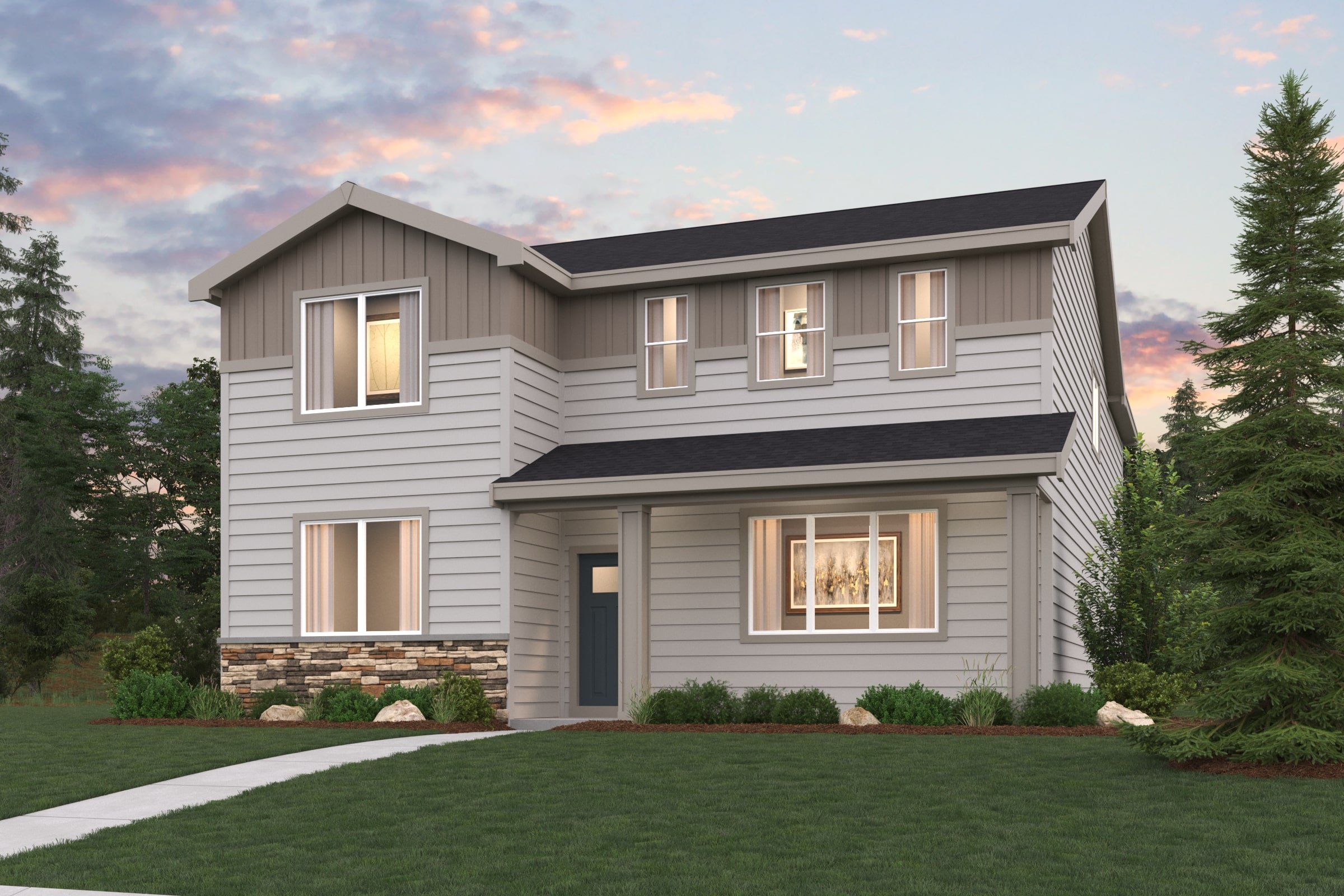 A house with a lawn in front of it.