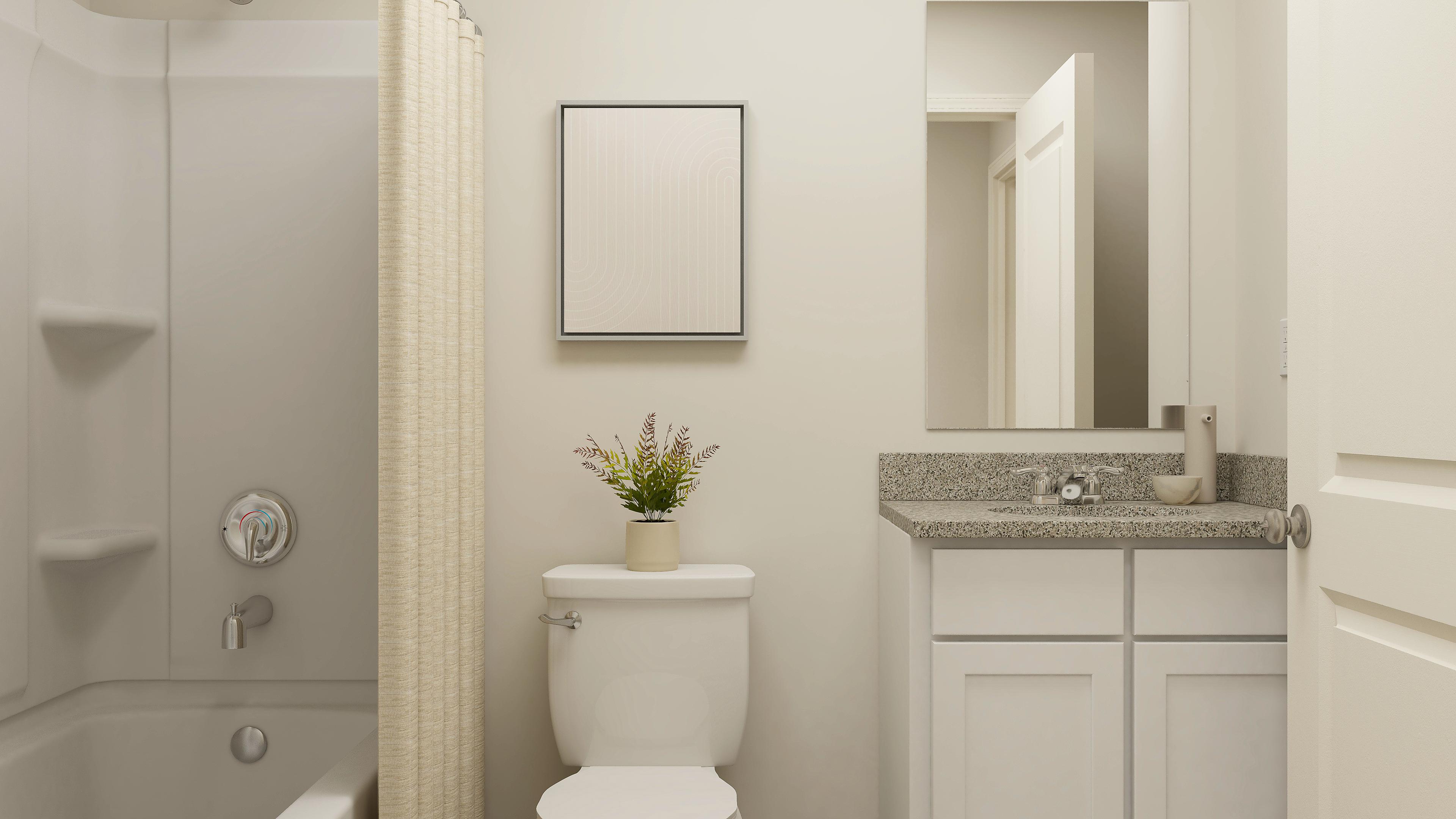 A bathroom with a toilet and sink.