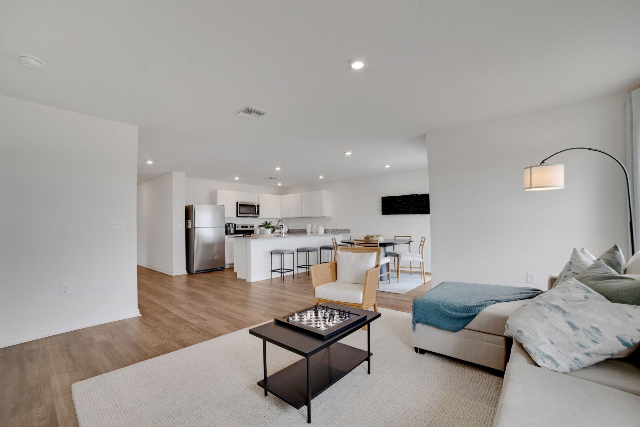 A living room with a couch and a table.
